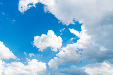 Wall Mural - Sky clouds background. Blue Heaven and white clouds. White cloudy Heaven with soft sun light. Clouds on pastel blue sky background. Sky Landscape Background. Sky Clouds Wallpaper.