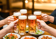 © TYAK_FACTORY - ビールで乾杯をするグループ