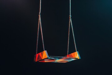 Wall Mural - Illuminated swing hanging in the air against a dark background