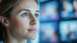 © smth.design - Woman focused on technology screens in a modern office setting