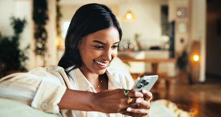 Aufkleber - Woman, phone and laughing with texting on couch in home, chat and funny meme in living room. Girl, person and smile with mobile app, relax and comic video on social network in lounge at apartment