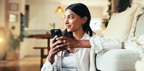 Aufkleber - Happy woman, mobile and thinking in home with social media, relax and interaction in online dating profile. Girl, phone or sofa in living room for comfort, notification or reply idea for text message