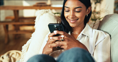 Aufkleber - Relax, phone and happy woman typing on sofa, reading news or post message on chat forum. Home, mobile and Indian girl with internet addiction, online shopping and communication on social media app