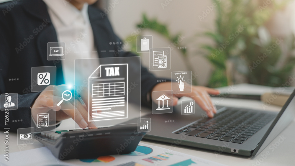Tax Computer Businessmen use a computer for Tax planning and calculation and ...