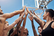 © peopleimages.com - People, fitness and huddle with hands together on basketball court below for teamwork, unity or solidarity. Low angle, group or team with circle or high five for sports, motivation or friendly game