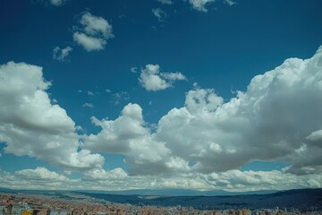 Poster - Dynamic white clouds gracefully drift over a vibrant city beneath a bright blue sky, Over a city, white clouds changing and moving in blue sky, time lapse