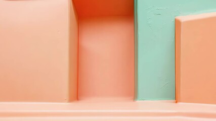 Aufkleber - A wall with a green triangle and a pink triangle. The wall is orange