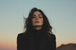 © Papukos - Fashion model posing at sunset with freckles showing and wind blowing hair
