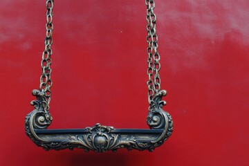 Poster - Ornate metal shelf hangs suspended by chains against red background