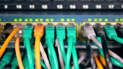 Wall Mural - Close up Ethernet cable on network switches light background Network internet cables data center.