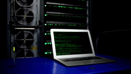 Wall Mural - technician working with laptop on data center internet equipment fix problem in the server room 4k