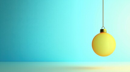 Wall Mural - bright yellow ornament hanging on minimalist blue background