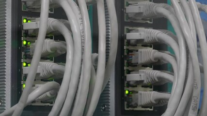 Wall Mural - connecting cable wires patch into data centers with led lights blinks. internet technology server 4k