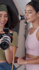 Poster - Choice, photographer and women with camera, digital and creative for photos in agency and teamwork. Photography, people and preparation for photoshoot in studio, backstage and decision for production