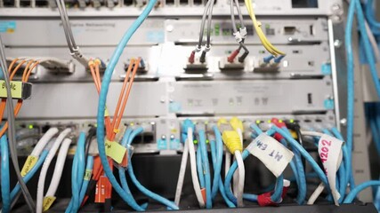 Wall Mural - Close up Ethernet cable on network switches light background Network internet cables data center.