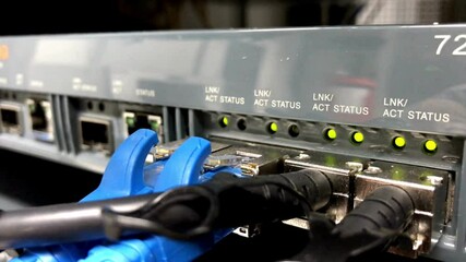 Wall Mural - connecting cable wires patch into data centers with led lights blinks. internet technology server 4k