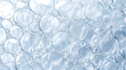 Wall Mural - Close-up view of delicate bubbles in soft light, creating a soothing, abstract background with translucent and airy qualities.