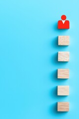 Poster - Colorful blocks on a blue surface represent growth and progress in business or personal development.
