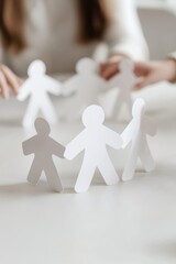 Poster - Creative paper cutouts representing and teamwork, ideal for collaboration and group concept imagery.