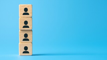 Wall Mural - Three wooden blocks with user icons stacked against a blue background, symbolizing social connection or teamwork.