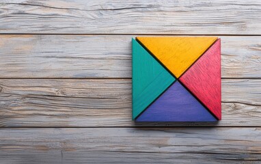 Poster - Colorful geometric shapes arranged on wooden background, ideal for educational and creative concepts.