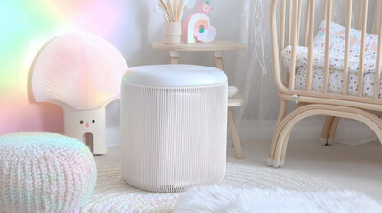 Sticker - cozy nursery with pastel decor featuring modern white air purifier, wooden crib, and soft knitted accents, creating serene atmosphere