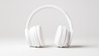 © tugkiara - White headphones on white background, music listening