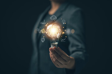 Poster - E-learning graduate certificate program concept.Woman holds a light bulb showing a brain icon. Concept of finding educational opportunities. Education Creativity and problem solving..