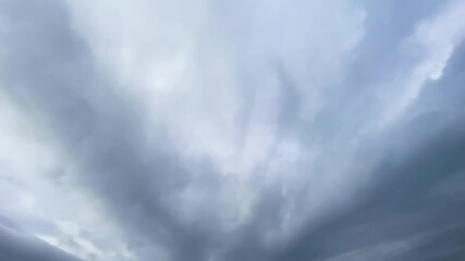 Wall Mural - white cumulus and cirrus clouds flowing on sky. nature, weather, air time lapse background