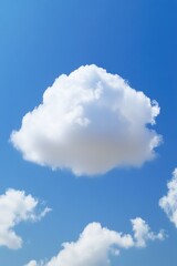 Poster - A plane soaring through the clear blue sky, with a fluffy cloud in the background