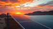 © Irina - solar panels in desert landscape with vibrant sunset and mountains in background