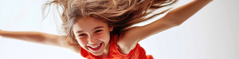 Poster - A young girl leaps high in the air wearing a bright red dress, full of joy and energy