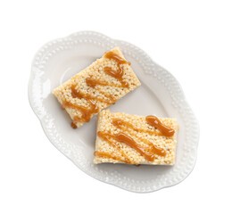 Wall Mural - Delicious caramel puffed rice bars isolated on white, top view