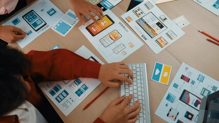 Poster - top view panorama video of startup company employee planning on user interface prototype for mobile 