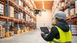 © Walid Forhad - Drone Delivery in Warehouse: A woman in a hardhat and safety vest stands in a warehouse, observing a drone flying overhead. Her hand rests on a tablet.