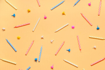 Wall Mural - Many colorful Birthday candles on orange background