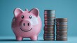 © MUMTAZ - A cheerful pink piggy bank beside stacks of coins, symbolizing savings and financial growth