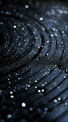 Poster - Macro shot of dark concentric circles with water droplets and bokeh light effects creating mysterious atmospheric background for luxury product photography.