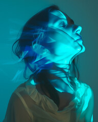 Wall Mural - Woman's Portrait with Teal Lighting and Motion Blur