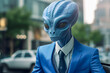 © Lucas - Anthropomorphic blue alien in a formal businessman suit