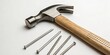© kansak01 - Minimalist Hammer and Nails in Focus - Simple Tool Aesthetics for Home Improvement, DIY Projects, and Construction Concepts, Soft Lighting, and Clean Background for Visual Appeal