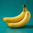 © Abdullahal - Fresh Ripe Bananas on Blue Background A vibrant still life of bananas with water droplets.