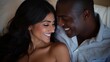 © Clearmind - Mixed couple, Indian woman and black man smiling at each other in bed. Horizontal photography (16:9)