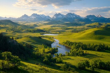 Wall Mural - Scenic valley landscape view with river winding through meadows near mountains