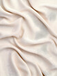 © Nadiyah - Soft light beige fabric with elegant folds for use as background and texture generative AI