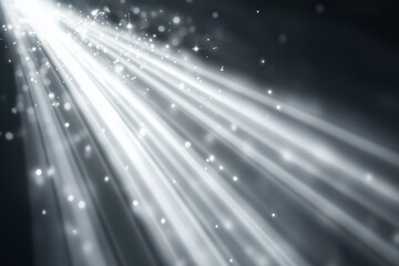 Poster - bright light shining through a dark room with a lot of white specks. The light is coming from a spotlight, and the specks are like stars. Scene is bright and energetic