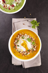 Wall Mural - Bowl of Vegetable Soup with Cream and Seeds