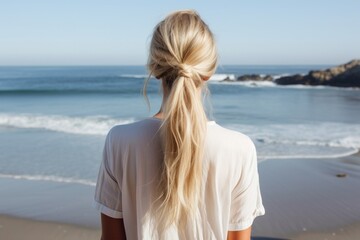 Wall Mural - Ponytail blonde beach adult.