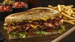 © tulip - Delicious gourmet burger with bacon, cheese, and fresh vegetables served with fries and sides