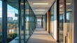 © Artem - Bright open workspace in modern glass-walled corridor